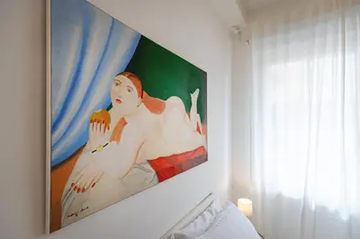 Letto o letti in una camera di Finestre sul mare
