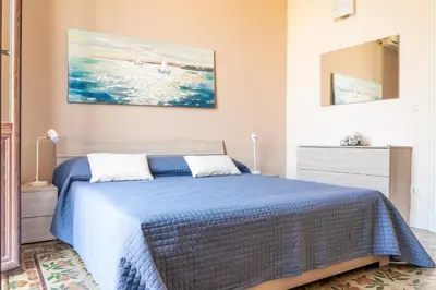 Letto o letti in una camera di Casa Callipoli
