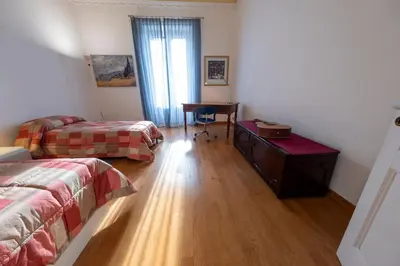 Letto o letti in una camera di La Corte dei Nespoli