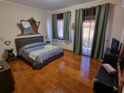 Letto o letti in una camera di VintageCo. Apartments