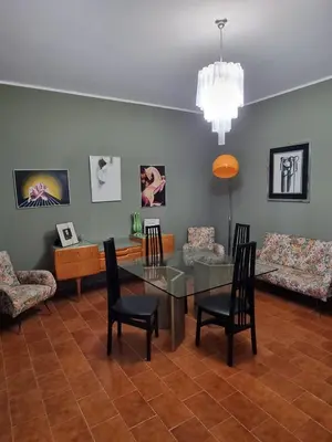 Area soggiorno di VintageCo. Apartments