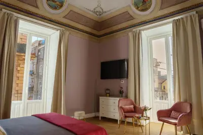 TV o dispositivi per l'intrattenimento presso Le Volte and Suite