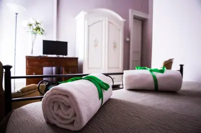 Letto o letti in una camera di Casa Elide