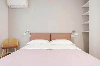 Letto o letti in una camera di Luna di mare - nuovo appartamento sul mare