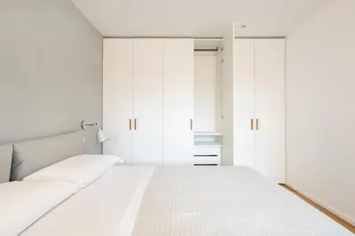 Letto o letti in una camera di Luna di mare - nuovo appartamento sul mare