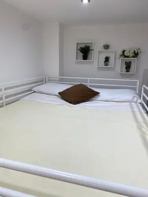 Letto o letti in una camera di La Marchesina House