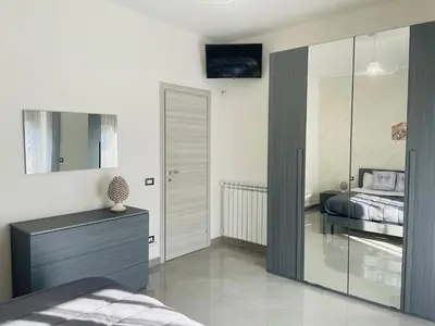 Letto o letti in una camera di La Pigna Casa Vacanza