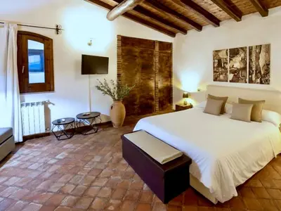 Letto o letti in una camera di B&B Villa Loriana