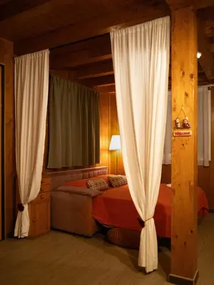 Letto o letti in una camera di Giardino Carya - Giarre Centro