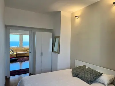 Letto o letti in una camera di Casa MarEtna