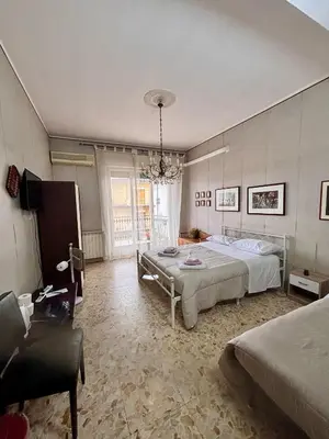 Letto o letti in una camera di Stanza 30 euro per 2 ore Giarre