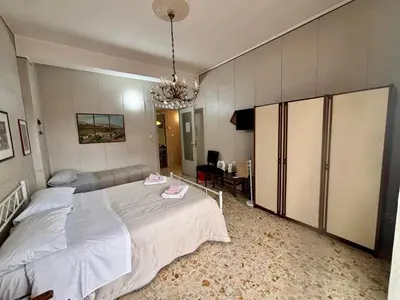 Letto o letti in una camera di Stanza 30 euro per 2 ore Giarre