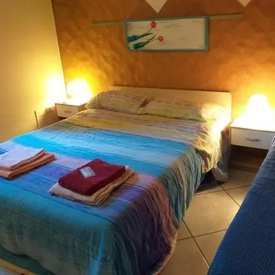Letto o letti in una camera di Stanza 30 euro per 2 ore Acireale