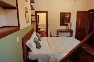 Letto o letti in una camera di La Maison De Catania