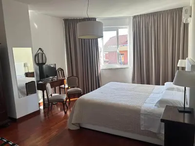 Letto o letti in una camera di RAMO FIORITO