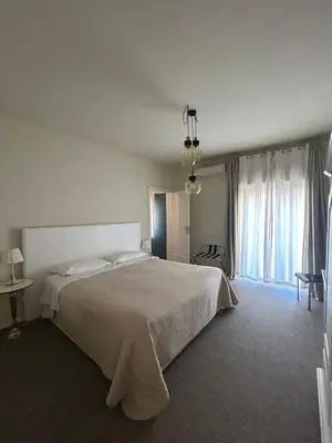Letto o letti in una camera di RAMO FIORITO
