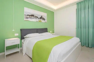 Letto o letti in una camera di La Vecchia Stazione Aci Castello