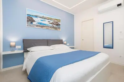 Letto o letti in una camera di La Vecchia Stazione Aci Castello