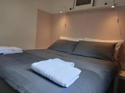 Letto o letti in una camera di La Casa di Madhu