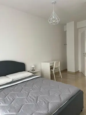 Letto o letti in una camera di Casa Vacanze Le Tre Scimmiette Chic