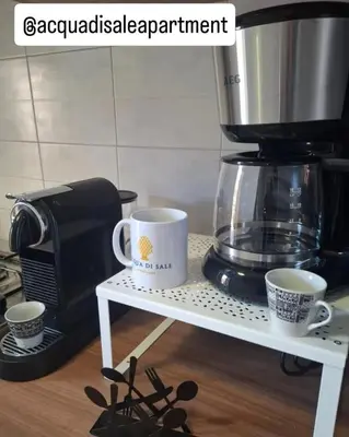 Set per la preparazione di tè e caffè presso Acqua di Sale Apartment