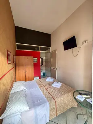 Letto o letti in una camera di Appartamento Ai piedi dell' Etna per gruppi fino a 20 persone
