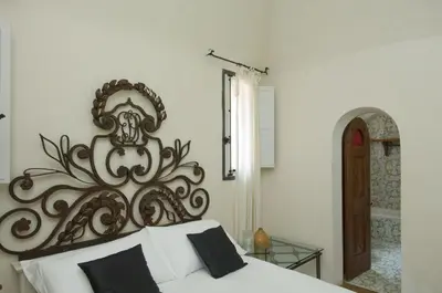Letto o letti in una camera di Villa Edera