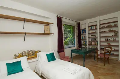 Letto o letti in una camera di Villa Edera