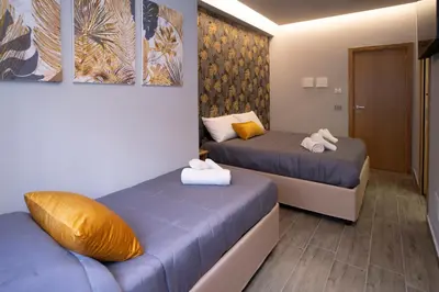 Letto o letti in una camera di La Scogliera In