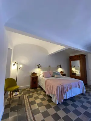 Letto o letti in una camera di Dimora dei Minoriti