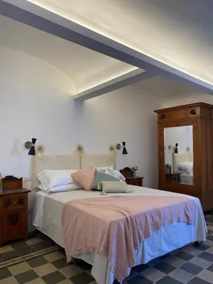 Letto o letti in una camera di Dimora dei Minoriti