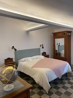 Letto o letti in una camera di Dimora dei Minoriti