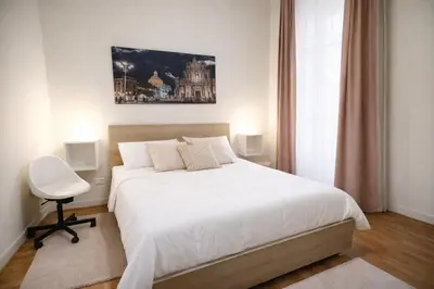 Letto o letti in una camera di Etnea Rooms 270