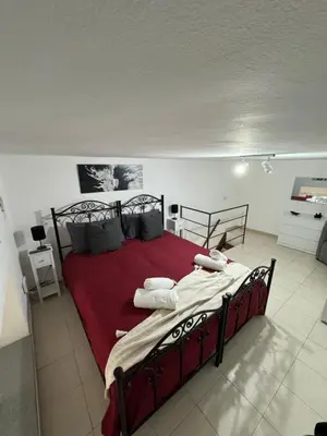Letto o letti in una camera di Casa Candy