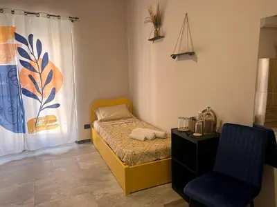 Letto o letti in una camera di Pura Vida Apartment
