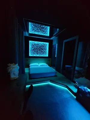 Letto o letti in una camera di Dark & Light rooms & luxury suites