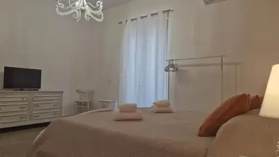 Letto o letti in una camera di Casa Vacanze sul Corso