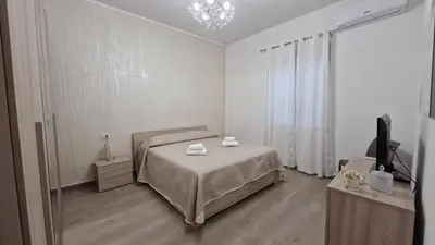 Letto o letti in una camera di Casa Vacanze sul Corso