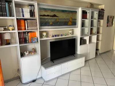 TV o dispositivi per l'intrattenimento presso Relax Sea Capomulini Appartamento su due livelli