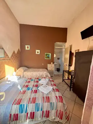 Letto o letti in una camera di BB Minicurcu, camere doppie