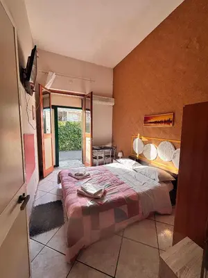 Letto o letti in una camera di BB Minicurcu, camere doppie