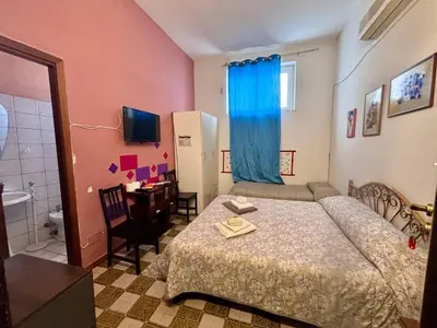 Letto o letti in una camera di BB Minicurcu, camere doppie