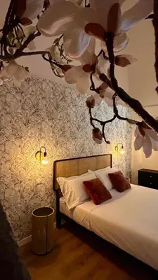 Letto o letti in una camera di Bellini Charm Apartments
