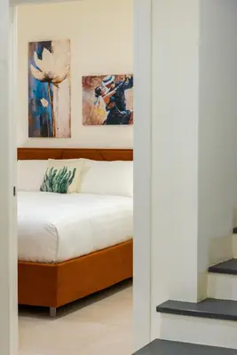 Letto o letti in una camera di Paolimura Resort , Apartment & Spa