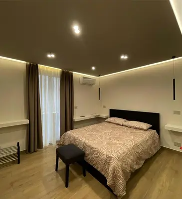 Letto o letti in una camera di Élite Etnea