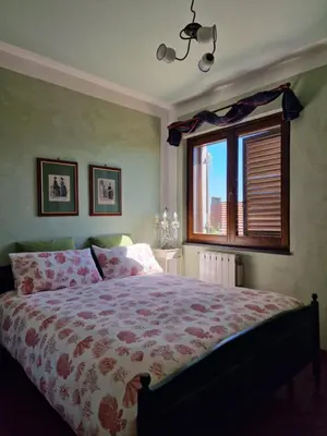 Letto o letti in una camera di Casa Delle Coccole