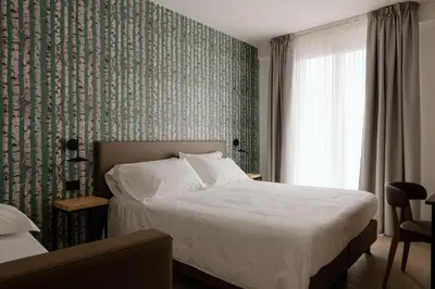 Letto o letti in una camera di Belladonna Hotel