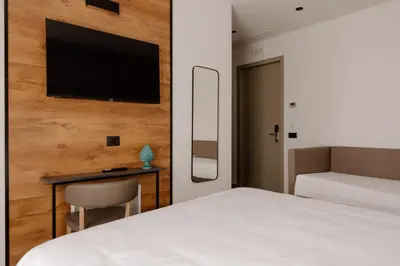 Letto o letti in una camera di Belladonna Hotel