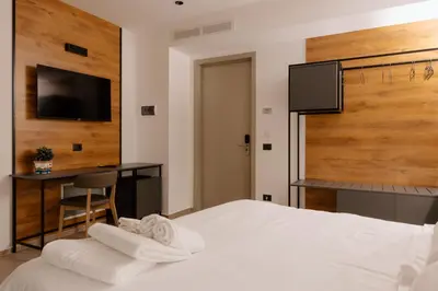 Letto o letti in una camera di Belladonna Hotel
