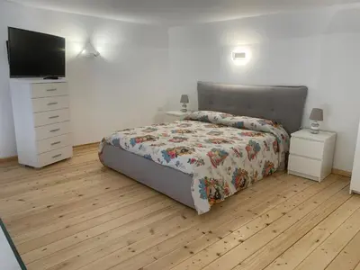 Letto o letti in una camera di Binario82